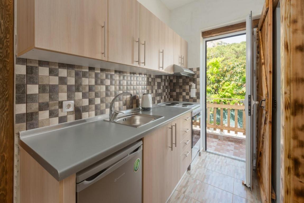 Christos Studios And Family Apartments Stegna Chambre photo